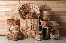Rectangular bamboo basket with woven pattern and handles. Sustainable, stylish storage for various items in your home.