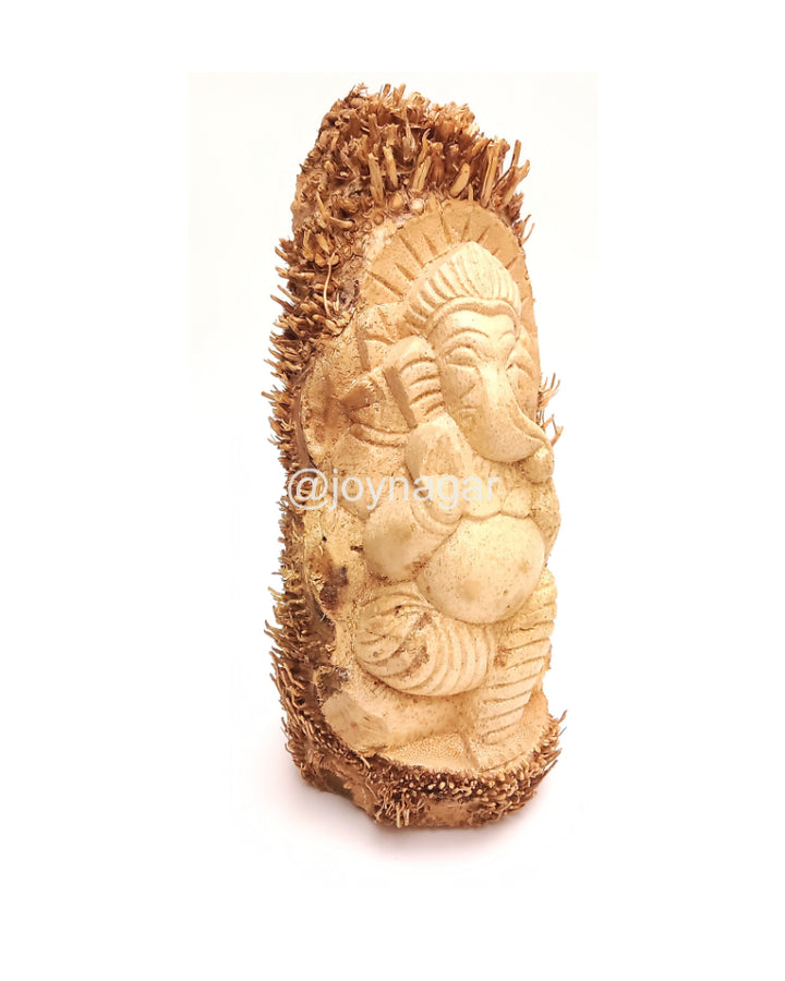 Bamboo root natural handmade gonesh murti for living room decoration . Joynagar handicraft